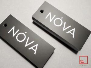 PRODUCTION OF CARDBOARD LABELS WITH A LOGO